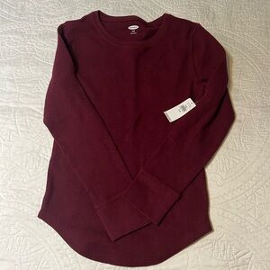 Brand new girls long sleeve shirt. Size medium